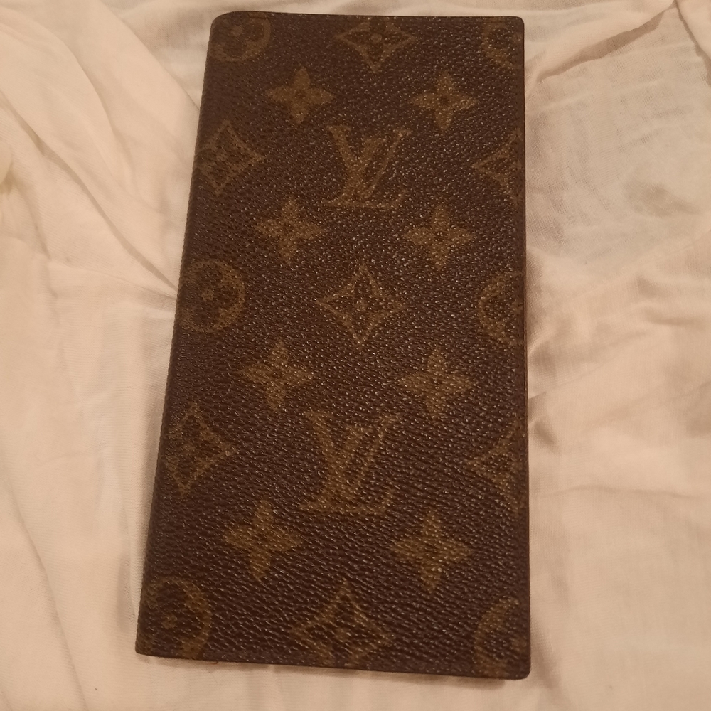 Louis Vuitton slim wallet.